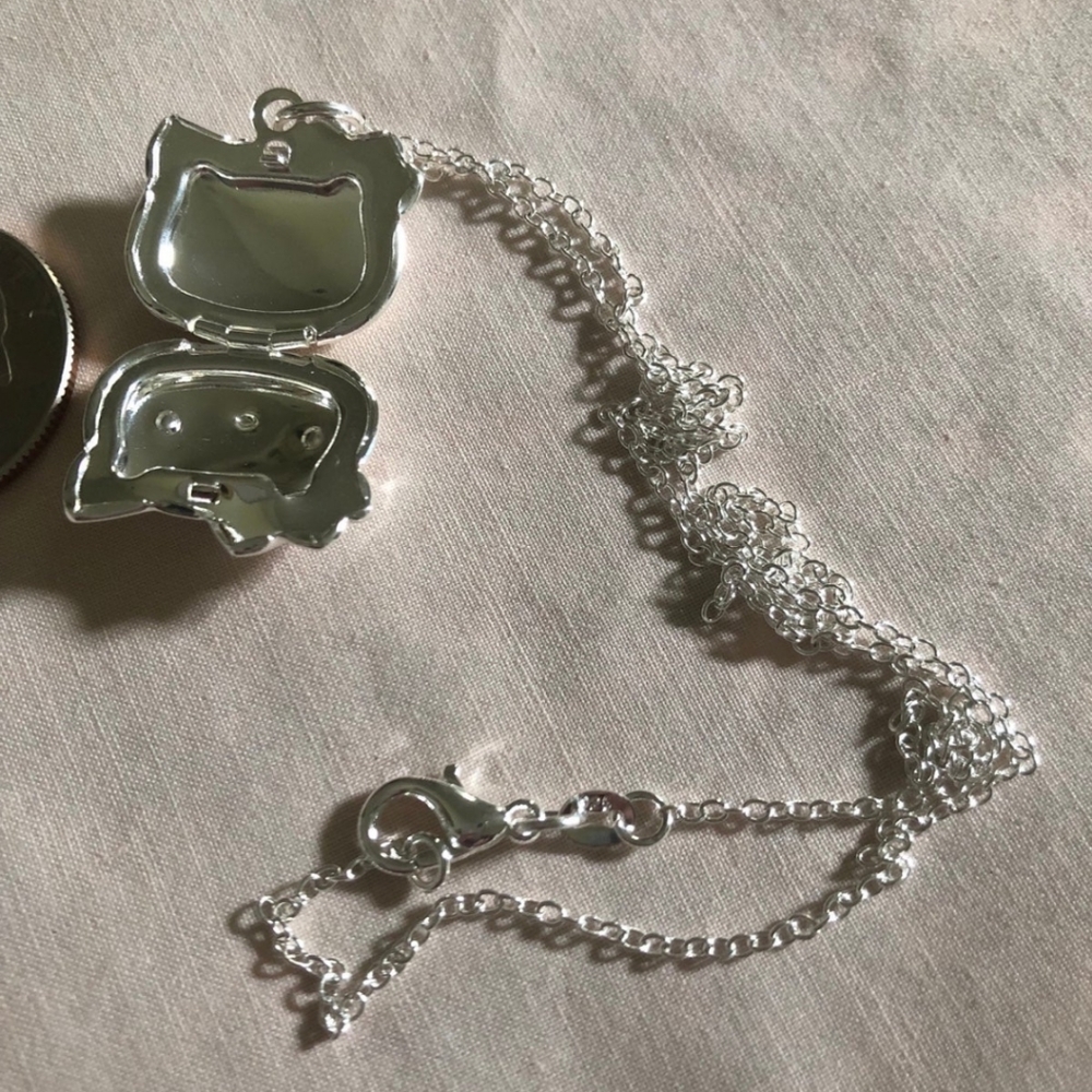New 925 stamped Plated Hello kitty Locket and Bracelet set.  BOTH ARE LOCKETS